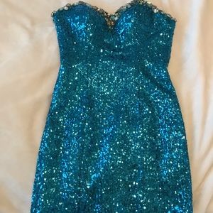 A Blue sequin cocktail dress.